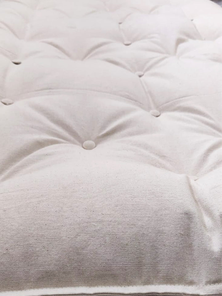 Portable folding mattress for travel made with natural kapok