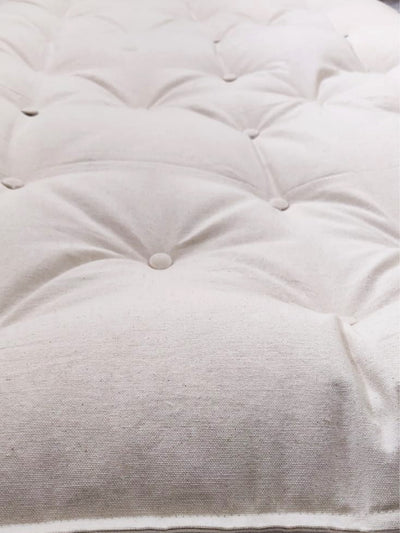 Portable folding mattress for travel made with natural kapok